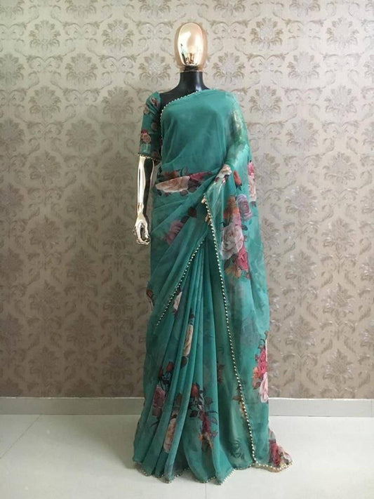 Blue Georgette Saree with Rose Prints and Pearl lace border work Saris & Lehengas Shopindiapparels.com 
